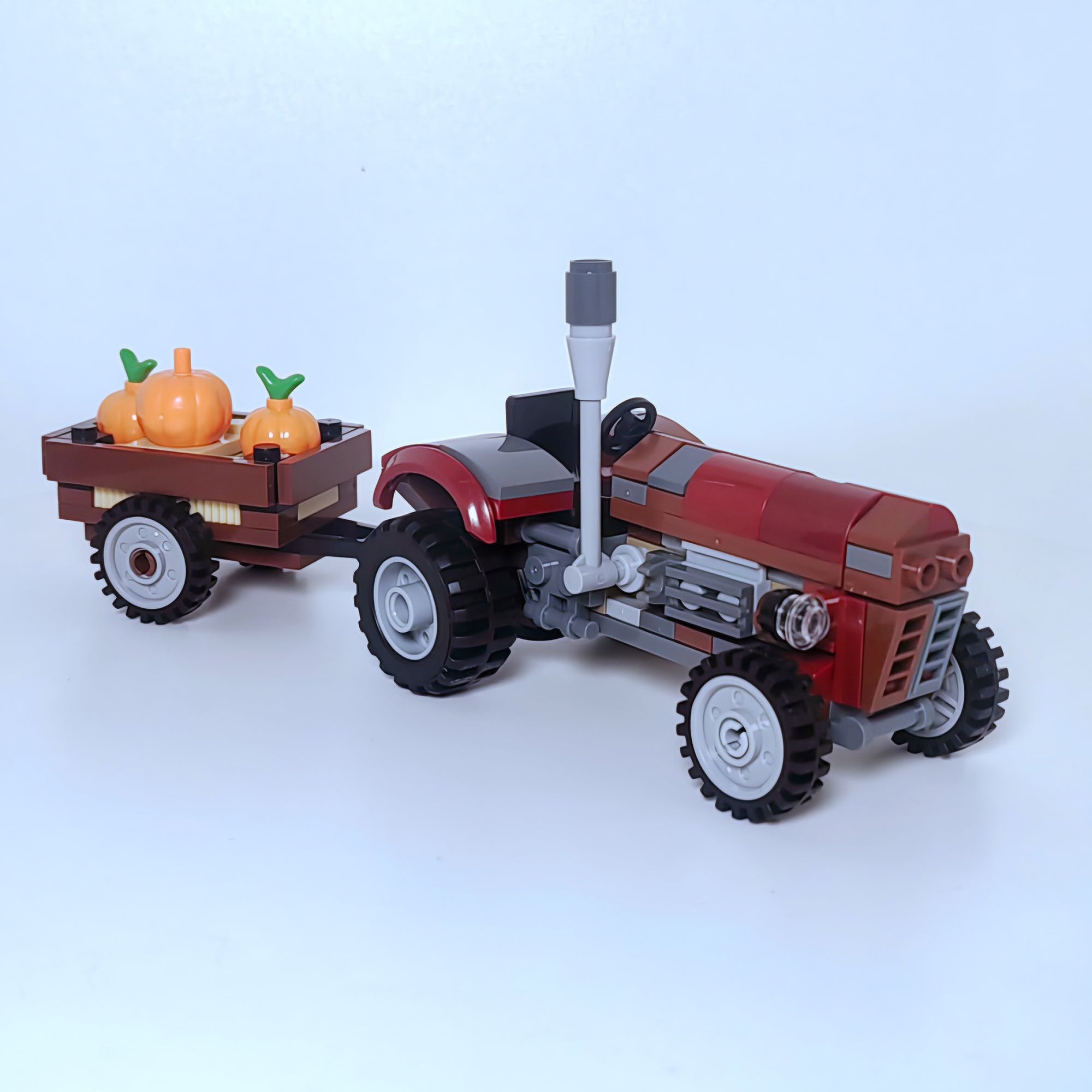 Vintage US Farm Tractor with Pumpkin Trailer