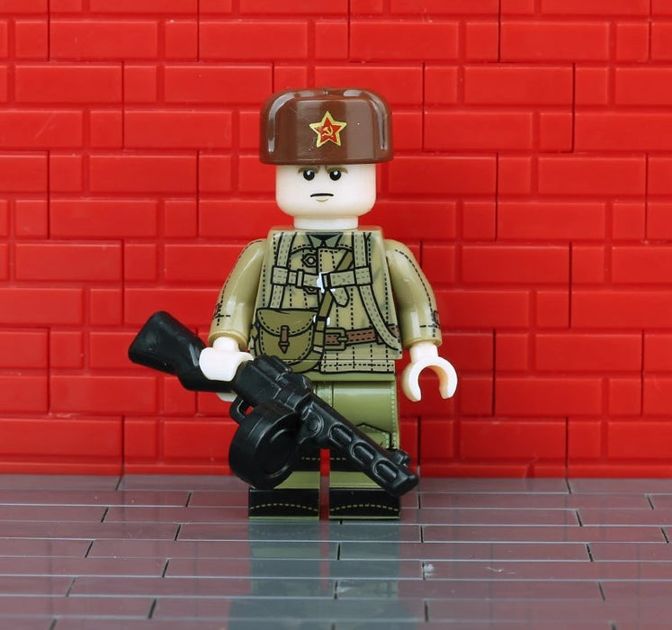 WW2 Soviet soldier posing behind a red wall